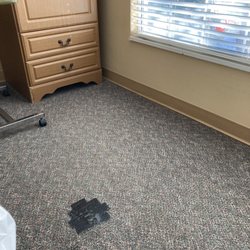 Vosswood Nursing Center - Dirty carpet patched with tape. They sweep weekly but never vacuum.