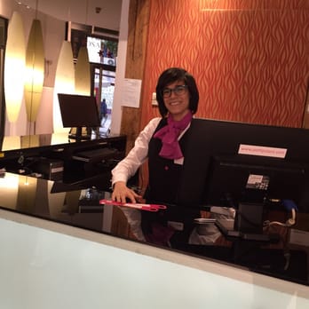 Petit Palace Posada del Peine - Our smiling receptionist. - Hotels Near Me - Madrid, M Petit Palace Posada del Peine - Our smiling receptionist. - Hotels Near Me - Madrid, M