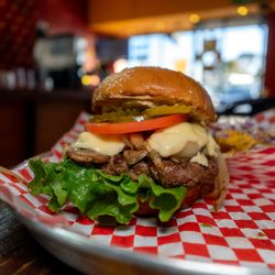 Hall Of Flame Burgers - 1/2 pound Swiss, onion, mushrooms burger $19