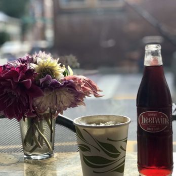 Zuma Coffee House - a cup of coffee and a bottle of soda - Coffee & Tea Near Me - Marshall, North Carolina