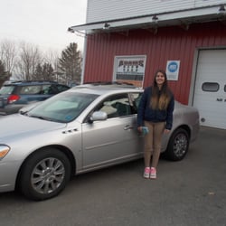 Adams Auto - This young lady is very excited about her new wheels that she recently purchased from Adams Automotive...