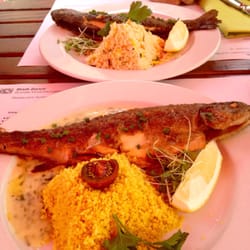 Forelle. Grilled fresh and whole. Tiny bones! Warning I had a hard time. Delicious sauce and couscous.