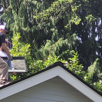 Sierra Construction - Installing, they are heavy windows - General Contractors Near Me - Woodinville, Washington Sierra Construction - Installing, they are heavy windows - General Contractors Near Me - Woodinville, Washington