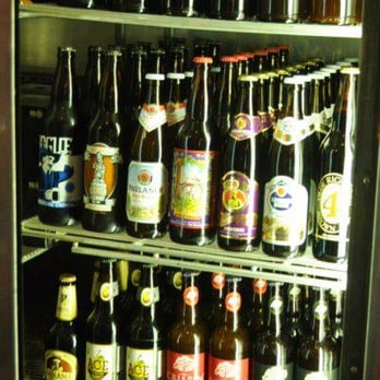 Cleveland Market - a refrigerator full of beer bottles - Convenience Stores Near Me - Richmond, Virginia