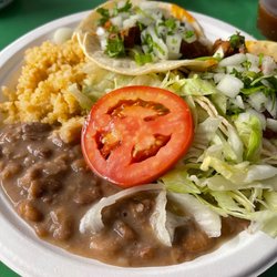 Tacos De Mexico - Tacos, rice and beans.
