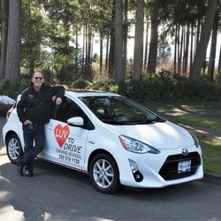 Luv To Drive Driving School - Instructor Bob with the Luv To Drive Prius Hybrid driving school car.