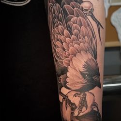 Outlaw Tattoo Studio and Body Piercing - Custom black and grey freehand tattoo