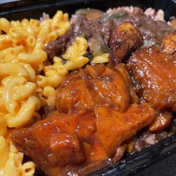 Aunty Joy's Jerk & Pizza - Macaroni and cheese, candied yams, rice and peas, jerk catfish. - Caribbean Near Me - Chicago, Illinois Aunty Joy's Jerk & Pizza - Macaroni and cheese, candied yams, rice and peas, jerk catfish. - Caribbean Near Me - Chicago, Illinois