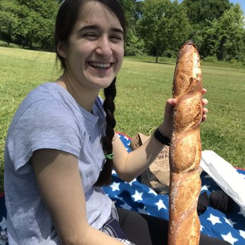 Yellow Dog Bread Company - holding the baguette for scale! huge! - Coffee & Tea Near Me - Raleigh, North Carolina