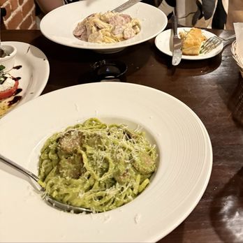 Biancoverde at Hotel Mac - Top plate is Chicken & Italian sausage fettuccine Alfredo pasta, the bottom plate is Italian sausage linguine pesto pasta. - Italian Near Me - Richmond, California Biancoverde at Hotel Mac - Top plate is Chicken & Italian sausage fettuccine Alfredo pasta, the bottom plate is Italian sausage linguine pesto pasta. - Italian Near Me - Richmond, California