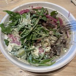 Build your own bowl - Arugula, steak, tzatziki, pickled red onion, feta cheese, cucumber, steak, lemon tahini sauce.