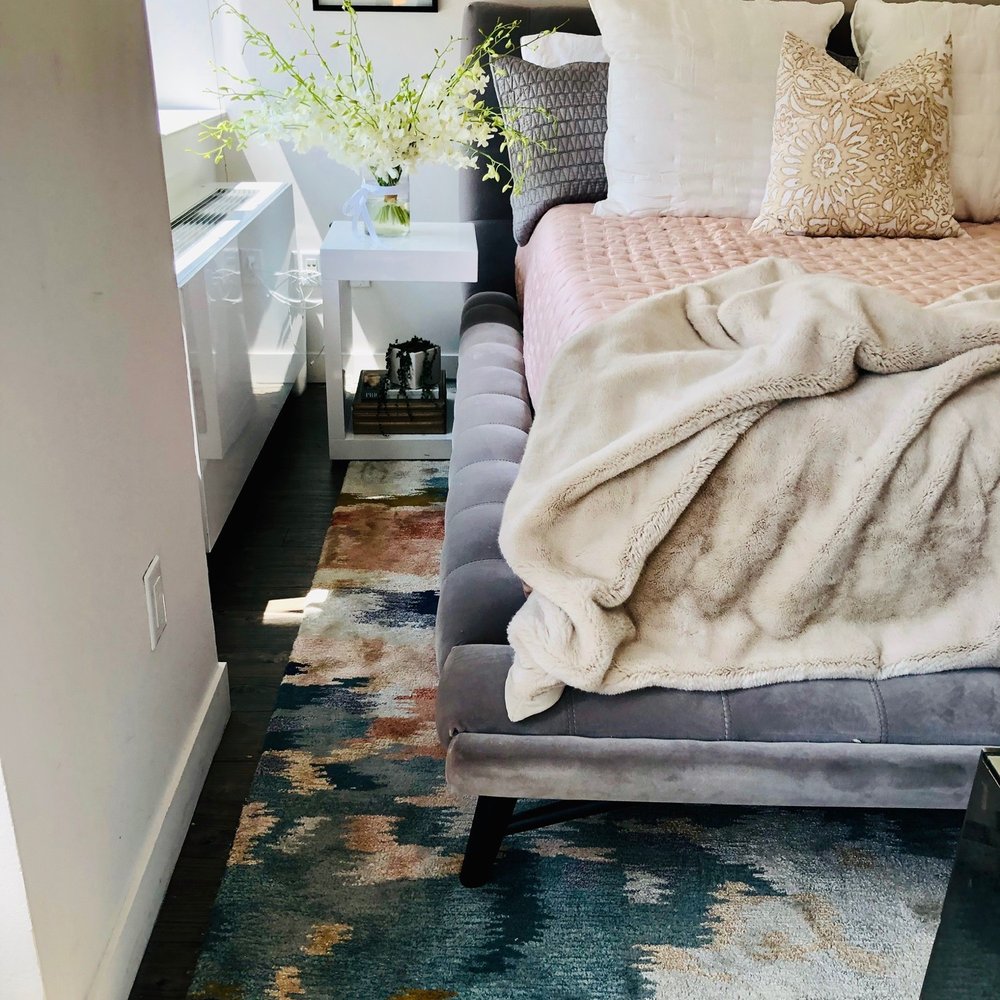 Scarborough Design Studio - This Roche Bobois bed combined with this affordable West Elm rug is possibly my favorite pairing in the apartment. - Interior Design Near Me Scarborough Design Studio - This Roche Bobois bed combined with this affordable West Elm rug is possibly my favorite pairing in the apartment. - Interior Design Near Me