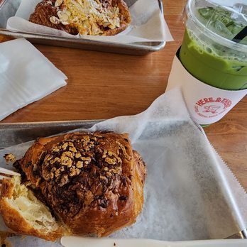 Here & There - Ham and cheese croissant and a lavender matcha latte. I already had a drink and bite of them. Oops - Coffee & Tea Near Me - Stanton, California Here & There - Ham and cheese croissant and a lavender matcha latte. I already had a drink and bite of them. Oops - Coffee & Tea Near Me - Stanton, California