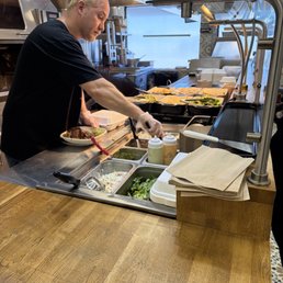 Getting a burrito bowl made Getting a burrito bowl made