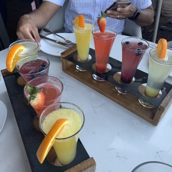 Hash Kitchen - Mimosa flight - pineapple, blueberry, strawberry and orange - Breakfast & Brunch Near Me - Scottsdale, Arizona Hash Kitchen - Mimosa flight - pineapple, blueberry, strawberry and orange - Breakfast & Brunch Near Me - Scottsdale, Arizona