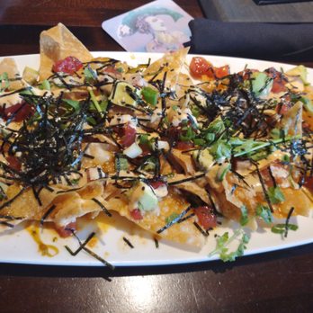 Yard House - Poking nachos - Bars Near Me - Sunrise, Florida Yard House - Poking nachos - Bars Near Me - Sunrise, Florida