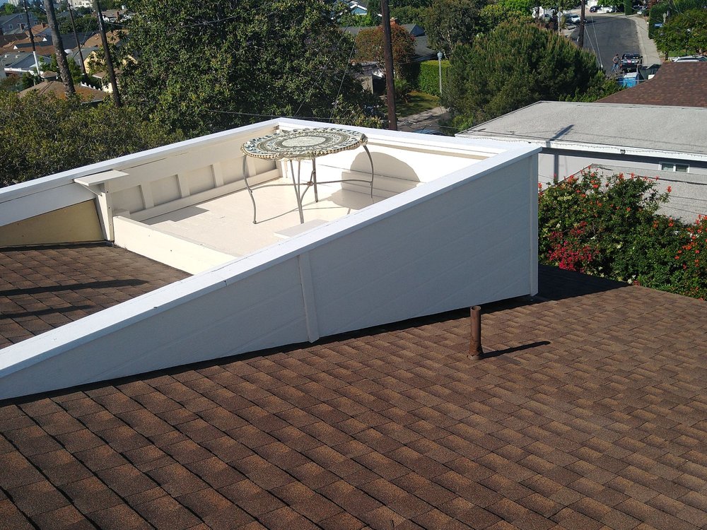 Slide of Lomeli Roofing Co