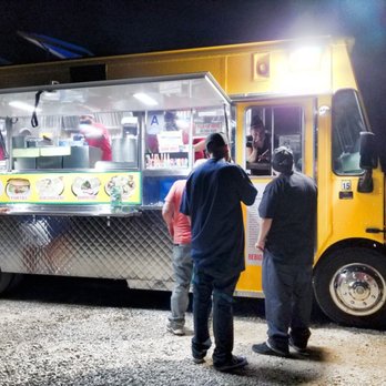 Tacos La Madrina - people ordering food from a food truck - Tacos Near Me - Hesperia, California Tacos La Madrina - people ordering food from a food truck - Tacos Near Me - Hesperia, California
