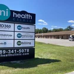 Michigan Health Clinics - Our front entrance sign features our Urgent Care, Lab, Dermatology, Family Practice, and Billing Company.