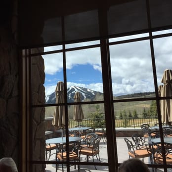 Sun Valley Clubhouse - a view of the mountains through a window - Local Flavor Near Me Sun Valley Clubhouse - a view of the mountains through a window - Local Flavor Near Me