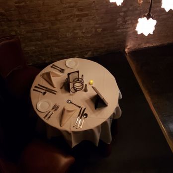 Muriel's Jackson Square - Ghost Table, gets set each day with wine, etc for the orig owner of this home. - Cajun/Creole Near Me - New Orleans, Louisiana