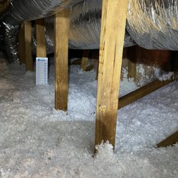 Yeti Home Insulation - After: It's like our attic got a snow day. Welcome to the Ice Age!
