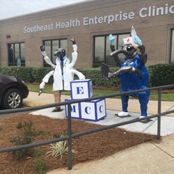 Southeast Health - Boll weevels stand outside