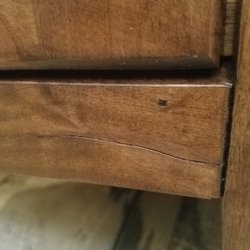 Walker's Furniture and Mattress - Broken front board under of left door first Aspen Console from Walkers Furniture in Kennewick, WA.