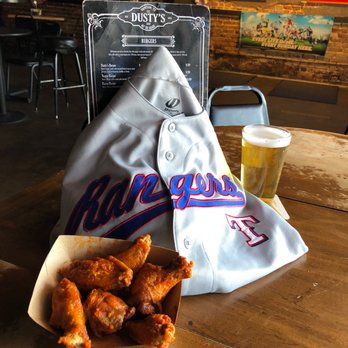 Dusty's Bar & Grill - a tray of fried wings and a glass of beer - Sports Bars Near Me - Denton, Texas Dusty's Bar & Grill - a tray of fried wings and a glass of beer - Sports Bars Near Me - Denton, Texas