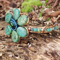 Blue Lagoon Wellness Center - Custom Genuine Turquoise set in copper with copper beads.