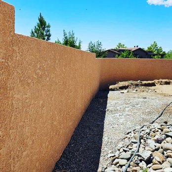 Sol O Alire Construction - New cinderblock wall installation with a acrylic stucco application by our staff here at Sol O Alire Construction. - Fences & Gates Near Me - Albuquerque, New Mexico