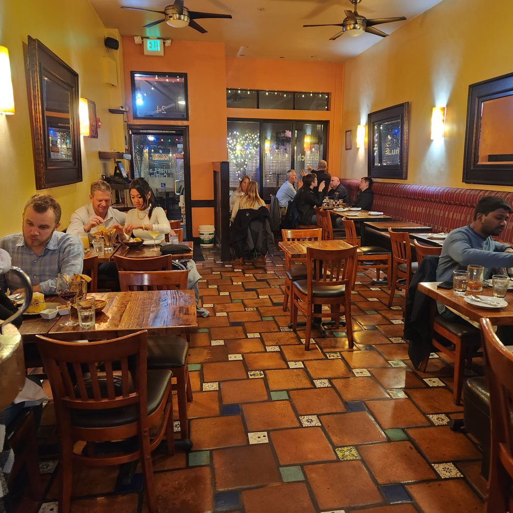 Franco's Latin Table - people sitting at tables in a restaurant - Latin American Near Me - San Francisco, California Franco's Latin Table - people sitting at tables in a restaurant - Latin American Near Me - San Francisco, California