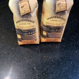 two bags of coffee on a counter