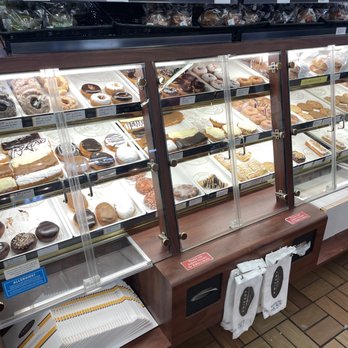Kwik Trip - a display case with a variety of pastries - Convenience Stores Near Me - Baldwin, Wisconsin
