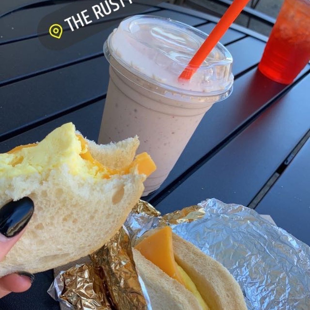 Rusty Cup - egg and cheese sandwich on sour dough bread w butter strawberry banana and mango smoothie - Coffee & Tea Near Me - Astoria, Oregon Rusty Cup - egg and cheese sandwich on sour dough bread w butter strawberry banana and mango smoothie - Coffee & Tea Near Me - Astoria, Oregon