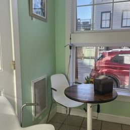 a small table and chairs a small table and chairs