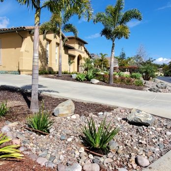 Clero's Landscaping - a driveway in front of a house - Landscaping Near Me