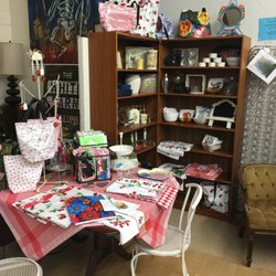 Cottage Home Decor - Storage can be creative and still efficient. Book cases, are a great upright solution. All sorts of containers will work.