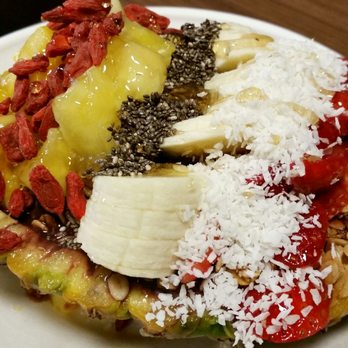 Superfruit Republic- Central Park - Superfruit Wonderbowl (pineapple shell) - acai, mango, bananas, pineapple, strawberries, goji berries, granola, coconut flakes, chia seeds - Juice Bars & Smoothies Near Me - Denver, Colorado