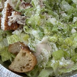 Got a bowl of parmesan cheese with a side of salad.