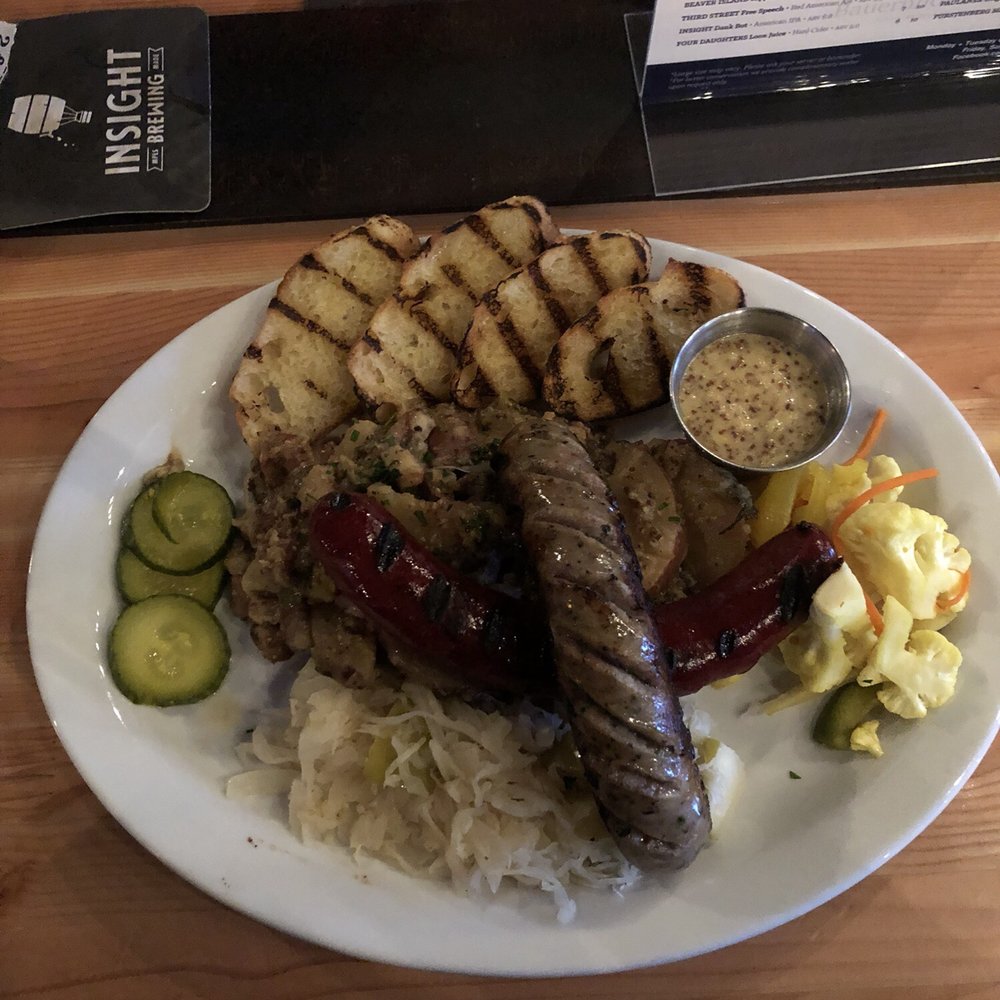 BK Tap Haus Restaurant - Platter with knockwurst and bratwurst, veggies, kraut, and German potato salad. Delicious!! - German Near Me - Saint Michael, Minnesota BK Tap Haus Restaurant - Platter with knockwurst and bratwurst, veggies, kraut, and German potato salad. Delicious!! - German Near Me - Saint Michael, Minnesota
