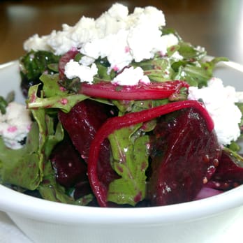 Romer's - Roasted organic baby beets with arugula, sweet onions, and goat cheese - Burgers Near Me - Vancouver, British Columbia Romer's - Roasted organic baby beets with arugula, sweet onions, and goat cheese - Burgers Near Me - Vancouver, British Columbia