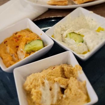 Hellenic Greek Kitchen - 3 dip Trio, Taziki, Classic and roasted red pepper hummus with grilled pita. - Greek Near Me - Charlotte, North Carolina