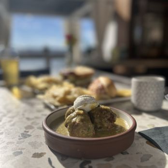 Eden Rooftop Bar - a bowl of food on a table - Bars Near Me - Phoenix, Arizona