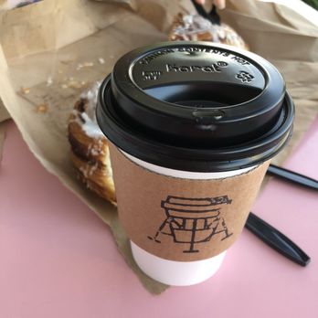 Giant Leap Coffee - Cinnamon roll and a caramel latte - Coffee & Tea Near Me - Houston, Texas Giant Leap Coffee - Cinnamon roll and a caramel latte - Coffee & Tea Near Me - Houston, Texas