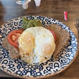 Avocado toast with over easy egg. Avocado toast with over easy egg.