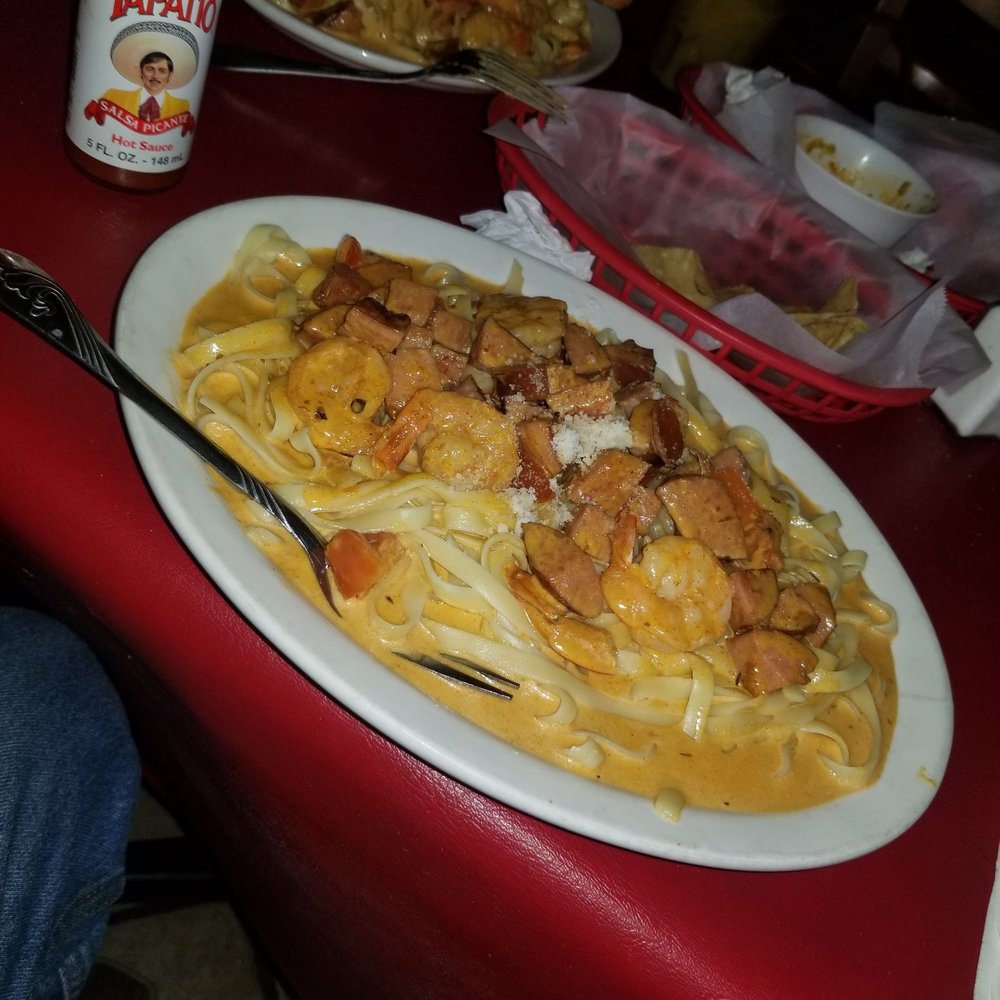 Meson Maya - a plate of pasta with chicken and sauce - Mexican Near Me - Dallas, Texas