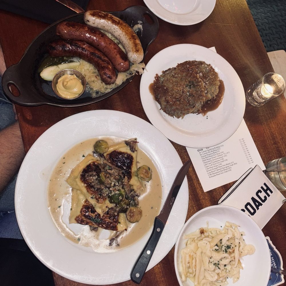 Wurst plate, cheese and leek pasta, spaetzle, potato pancakes