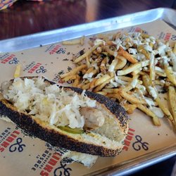 Jansenville Brat with Garlic fries.