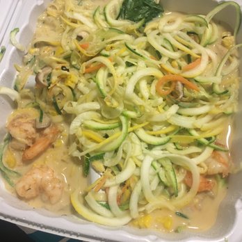 Mad Cow Grill - Gluten free Rasta pasta made coconut cream sauce, shrimp, with zucchini noodles, julienne cut carrots, spinach and fresh corn - American Near Me - Laurel, Maryland